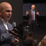 scena-inedita-la-oradea.-cu-ilie-bolojan-pe-scena,-oamenii-de-la-biserica-baptista-speranta-au-inaltat-o-rugaciune-pentru-intelepciunea-lui-bolojan:-doamne,-ma-rog-in-mod-special-pentru-domnul-prim-ministru-al-tarii-noastre