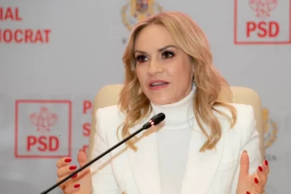 gabriela-firea-a-atras-toate-privirile-la-botezul-nepoatei-sale.-ce-tinuta-rafinata-a-ales-sotia-lui-florentin-pandele